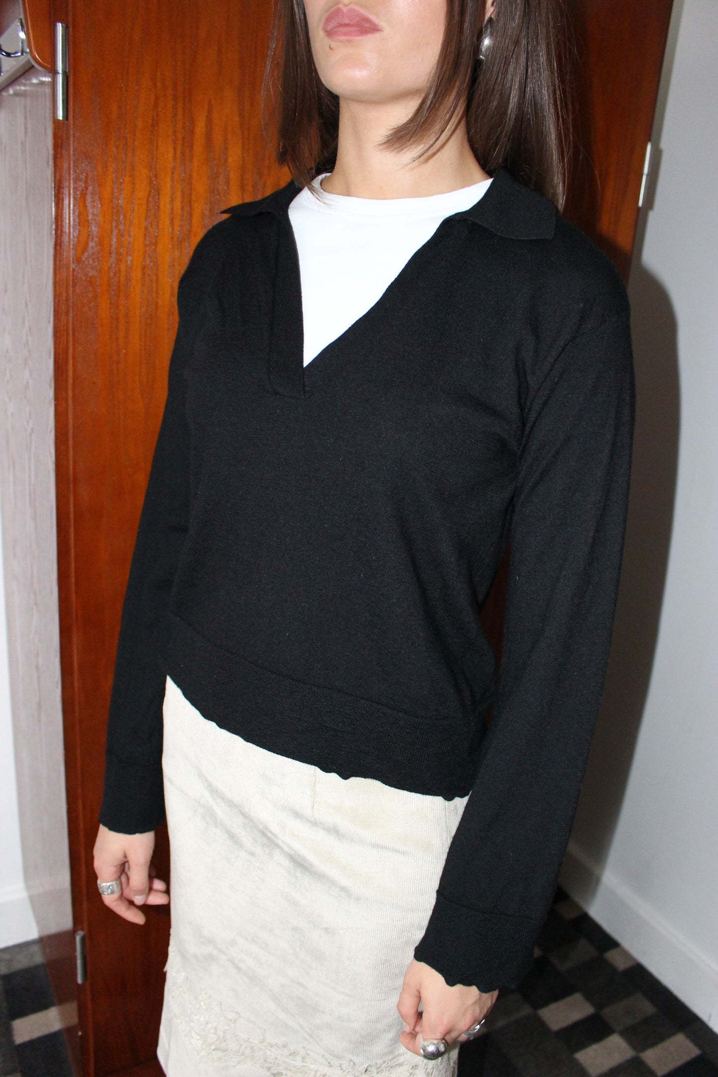 Strikket polobluse i uld
